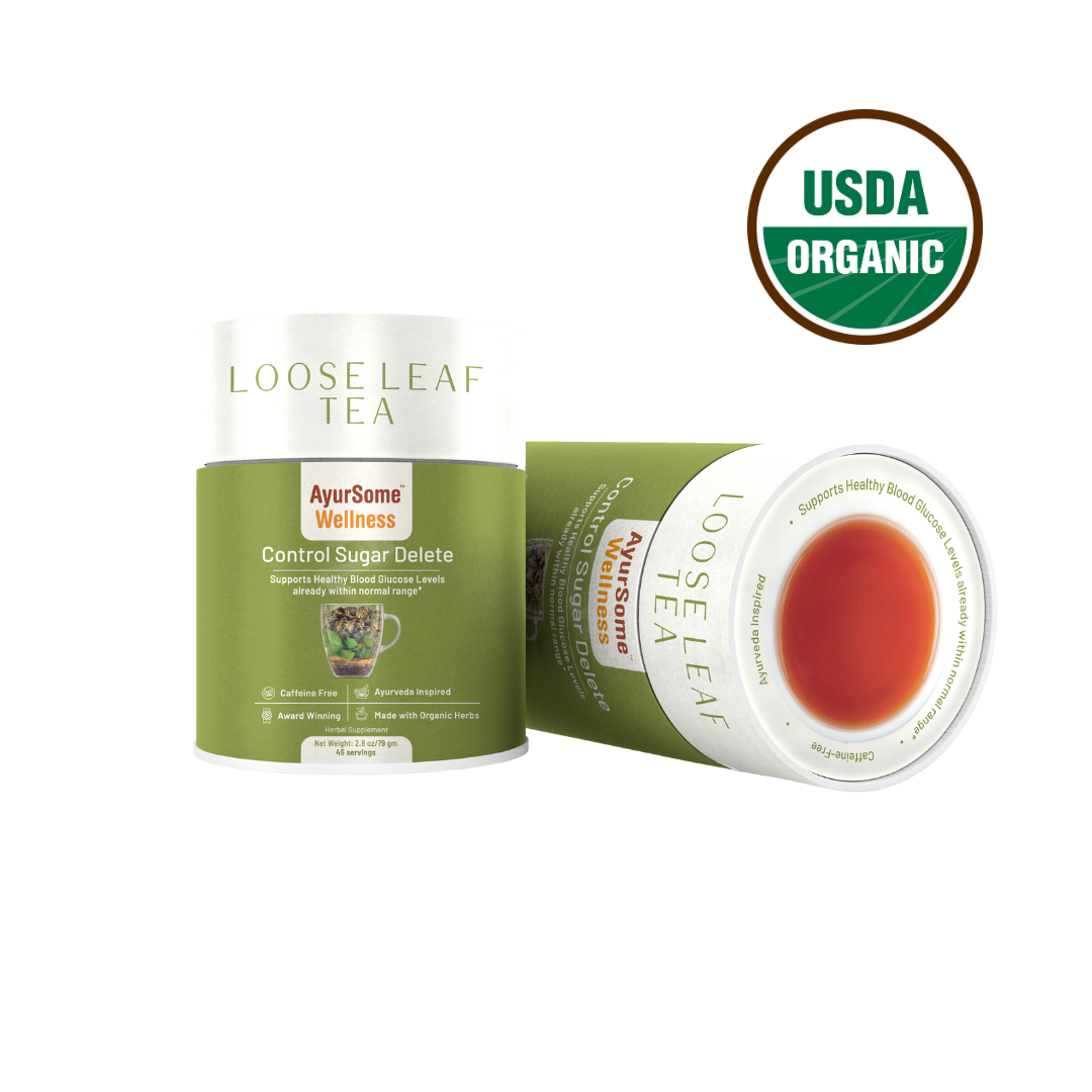 a green pack with the white tea written loose leaf on the lid. inside the pack is loose leaf gymnema aka gurmar tea blend. the herbal tea is organic as indicated on the top right corner
