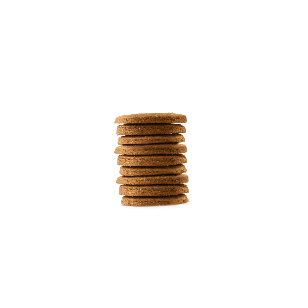 A stack of einkorn whole wheat cookies. The cookies have no refined sugar and are brown in color
