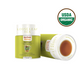 Green pack with white lid. Lid says loose leaf. The pack contains tulsi ginger and licorice root tea for cold and allergies. the top right side says the herbal tea is organic.
